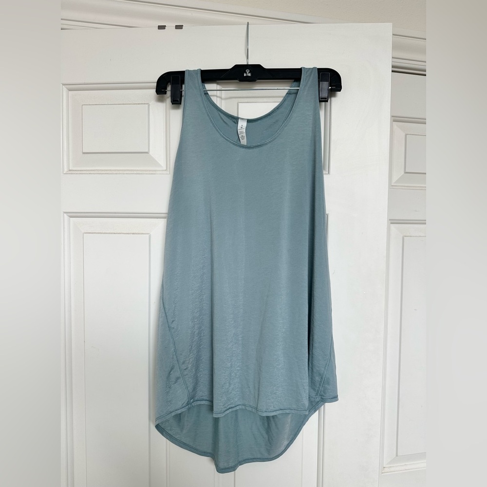 Lululemon essential tank top - light blue/green in color - size 8